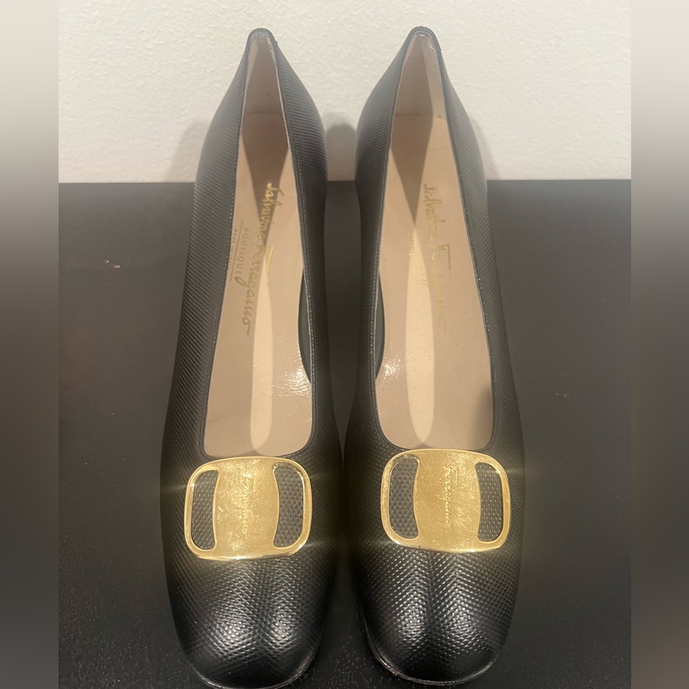 Ferragammo vintage women’s loafers with gold hardware.
